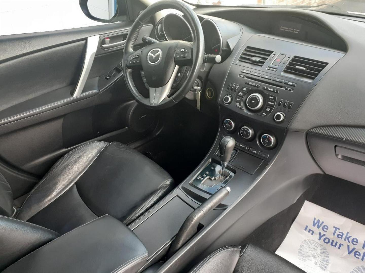 2012 Mazda MAZDA3 s Grand Touring 4-Door (JM1BL1W64C1) with an 2.5L L4 DOHC 16V engine, located at 2015 Cambell Street, Rapid City, SD, 57701, (605) 342-8326, 44.066433, -103.191772 - CARFAX AVAILABLE - Photo#5